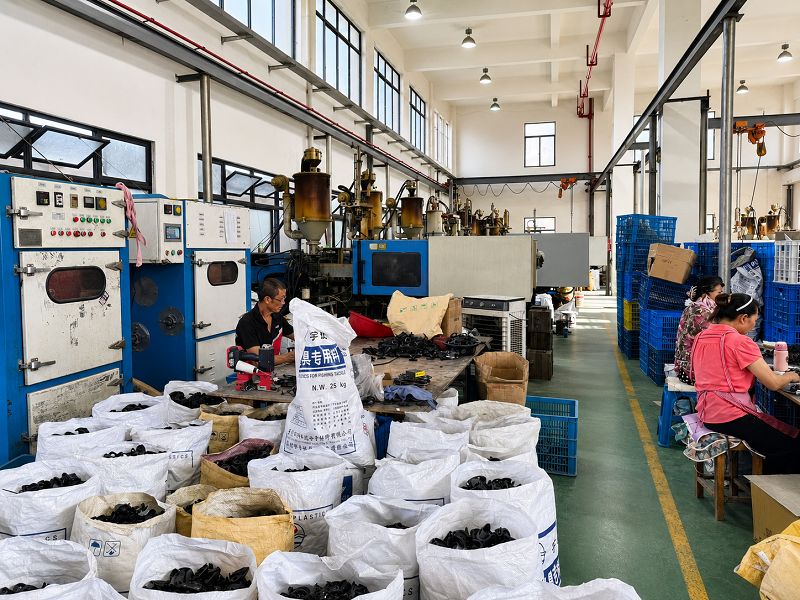 Injection-molded fishing reel bodies ready for processing Injection-molded fishing reel bodies ready for processing